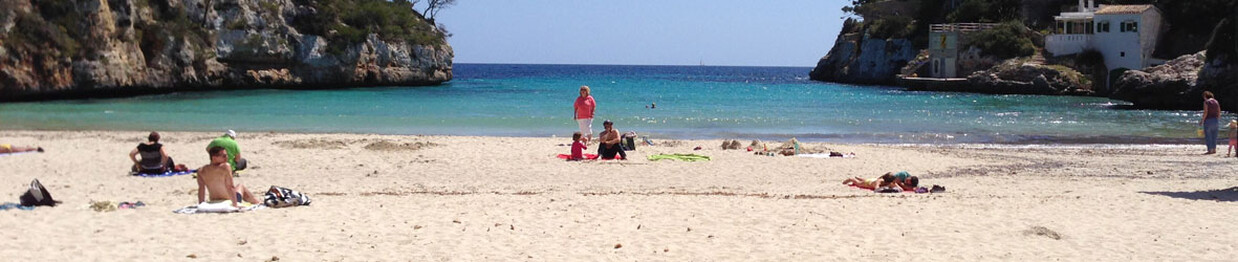 Strand und Hausbucht